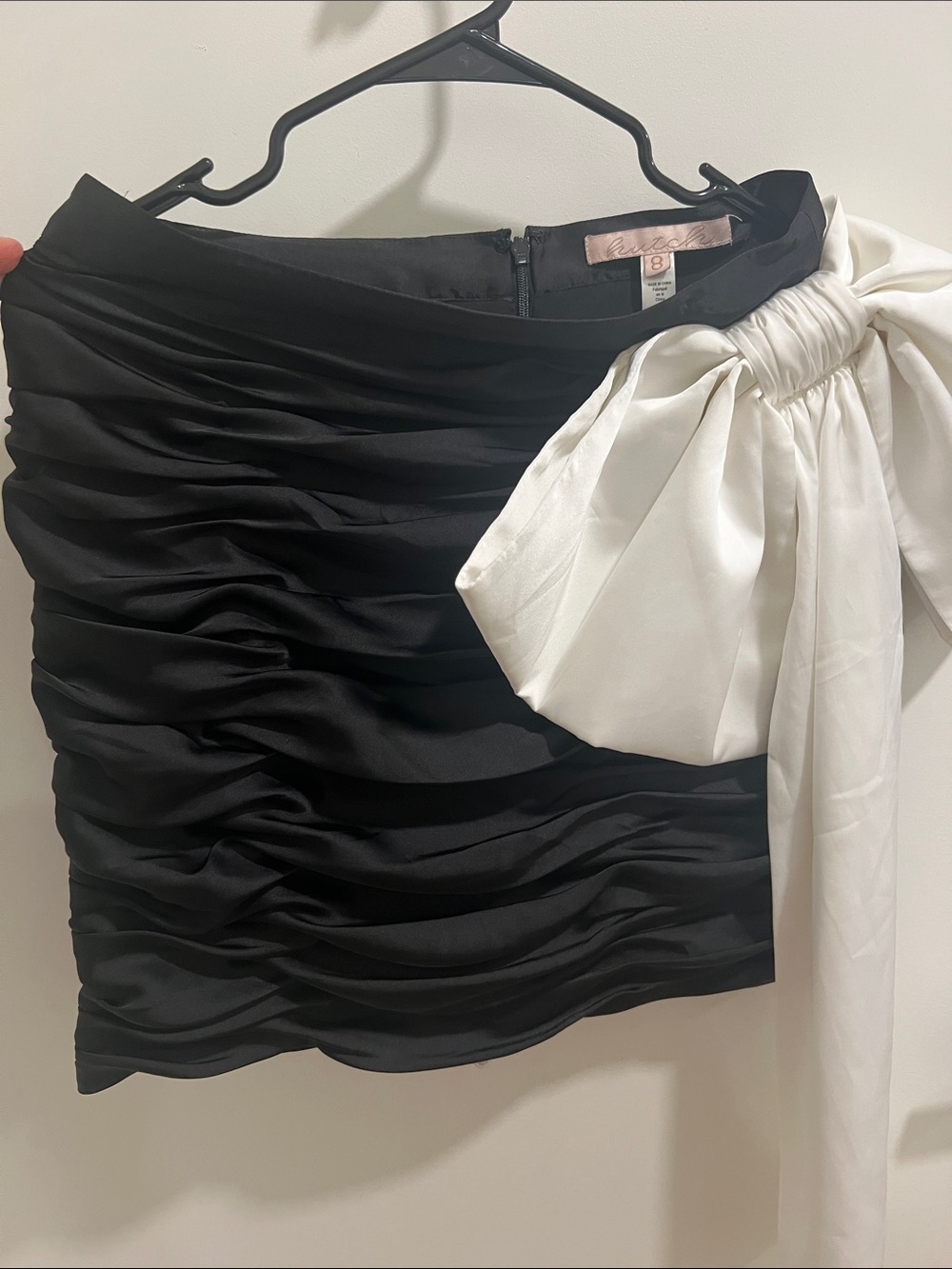 Kay Unger Black Mini Skirt with Ivory Statement Bow